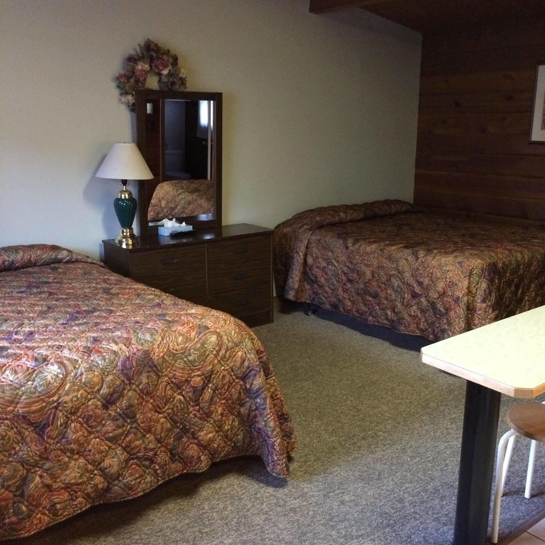 Raccoon Lodge Motel Sylvan Lake Exterior photo